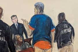 El presidente de Venezuela, Nicolás Maduro (centro), reacciona ante alguien del público tras una vista en una corte federal en Manhattan, el 5 de enero de 2026, en Nueva York. FOTO: