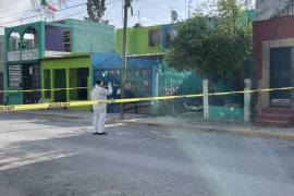 La calle Melchor Ocampo, donde se encontró al joven, quedó acordonada por las autoridades tras el trágico hallazgo.