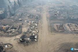 Los incendios forestales en la vasta región rusa de Siberia están poniendo en peligro una docena de aldeas y provocaron evacuaciones y otras precauciones de emergencia.AP/Vadim Skryabin/NewsYkt