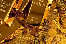 El precio del oro y de la plata, considerados inversiones refugio, aumentó, mientras el dólar se depreció y los futuros europeos y estadounidenses se hundieron. FOTO: