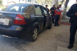 En el interior de este Chevrolet Aveo acabó la historia del infortunado habitante de Ramos Arizpe.