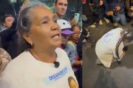 A unas horas de la inauguración del Mundial 2026, una madre buscadora se arrodilló frente a un cerco policial para pedir acceso a las inmediaciones del Estadio Ciudad de México.