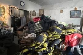 La vivienda presentaba acumulación extrema de basura y objetos inservibles.