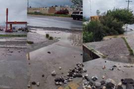 El vado en el bulevar Emilio Arizpe, casi en cruce con Paseo del Cortijo, se llenó de escombros y piedras debido a las lluvias, complicando el tránsito vehicular.