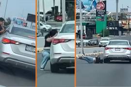 Automovilistas captaron el momento en que el conductor de un auto Sentra aceleró, tras un presunto choque al vehículo de una mujer.