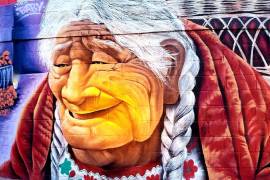 Artistas urbanos realizan mural con personajes de 'Coco' en panteón de Guanajuato
