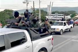 Hombres armados, presuntamente ingresó al poblado de San Gregorio Chamic, en Frontera Comalapa, Chiapas, en medio de gritos de apoyo y aplausos.