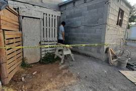El cuerpo fue localizado en la parte posterior de la vivienda.