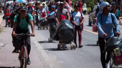 Un grupo de aproximadamente 200 personas en situación migrante cruzan Oaxaca, a pesar de la alerta por el huracán ‘John’ que, actualmente, es categoría 2.