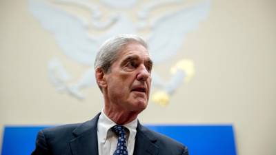 El exfiscal especial Robert S. Mueller III llega a una audiencia del Comité de Inteligencia de la Cámara de Representantes en el Capitolio, en Washington, el 24 de julio de 2019.