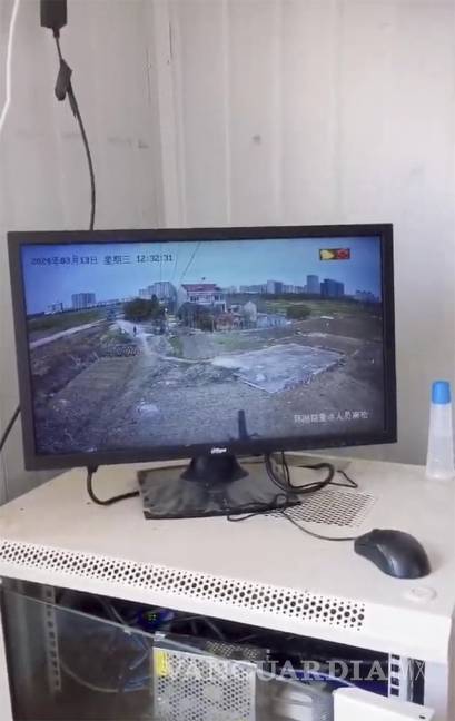 $!Una pantalla muestra la vigilancia de la casa Yang desde un puesto policial al otro lado de la calle en Changzhou, en el este de la provincia oriental china de Jiangsu.