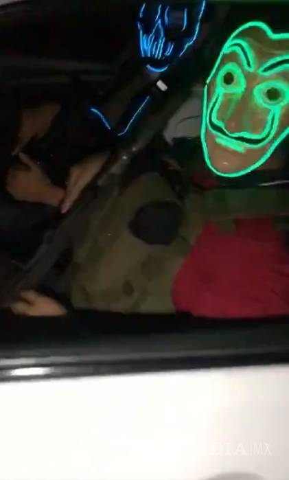 $!Sicarios celebran liberación del hijo del Chapo