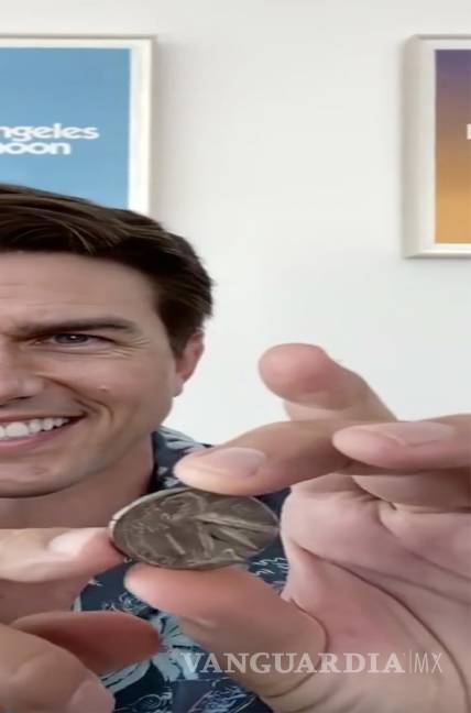 $!Fotograma de un ‘deepfake’ (video falso) en el que Tom Cruise hace un truco con una moneda.