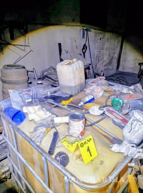 Fiscalía catea taller, tras incendio que calcinó más de 20 autos y dejó tres heridos, en Nuevo León