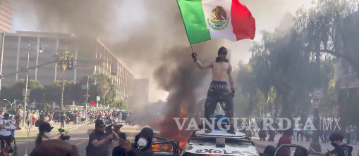 $!Bandera de México en protestas contra redadas en EU, sí puede ser una ‘provocación’: reconoce Sheinbaum