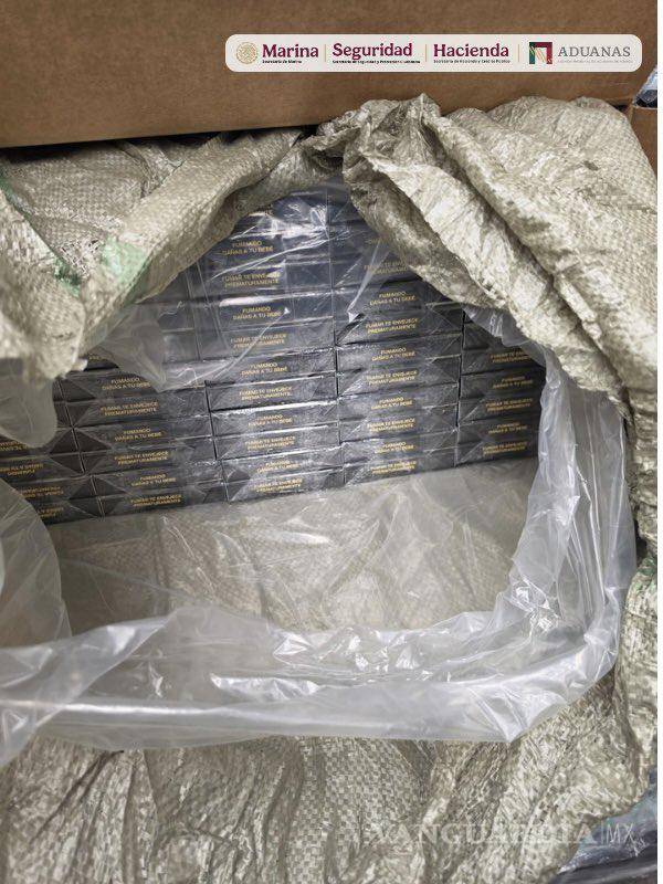 $!Marina y ANAM aseguran más de 5.4 millones de cigarros en el AICM