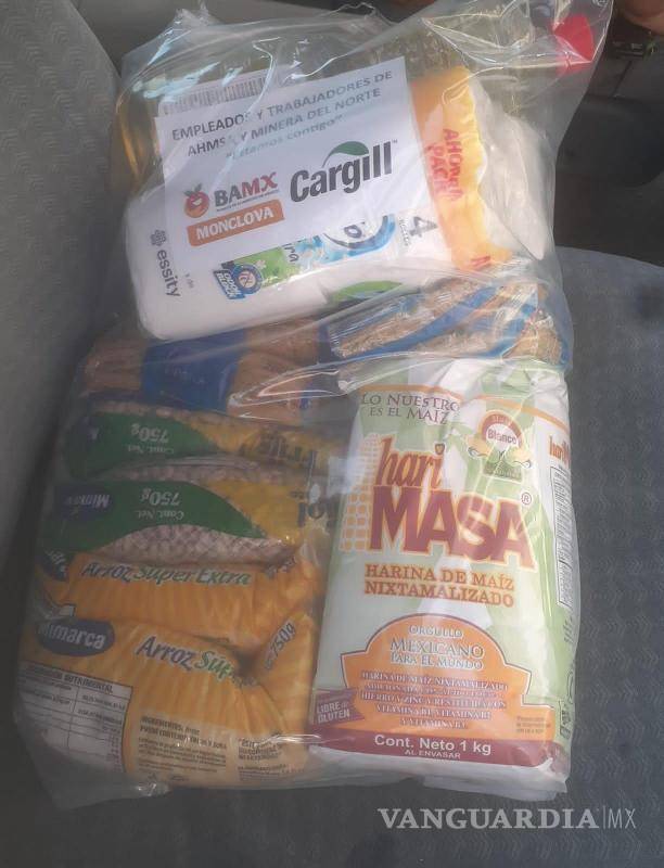 $!La despensa es un importante apoyo para estos obreros que la pasan mal.