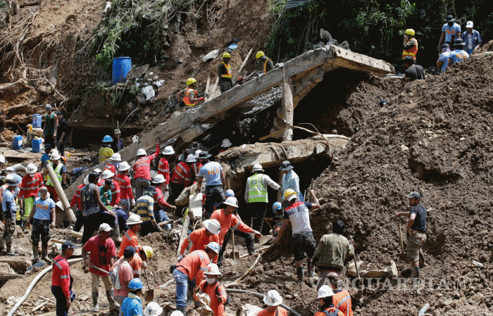 $!Filipinas prosigue agónica búsqueda de decenas de atrapados en mina de oro