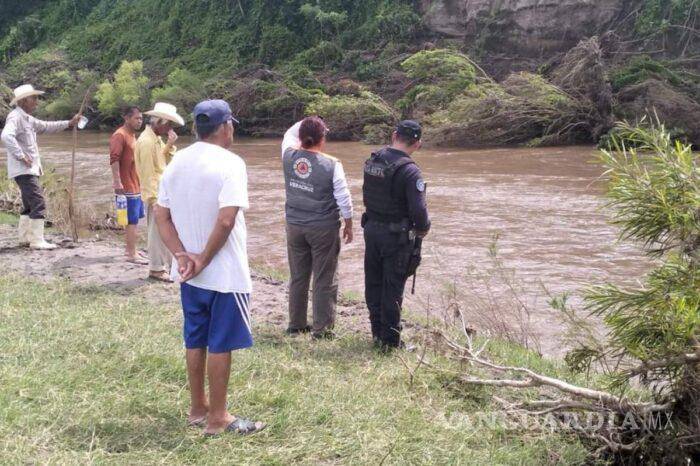 $!Fue un voluntario de la comunidad, quien con equipo básico, ubicó el cuerpo del niño y logró rescatarlo