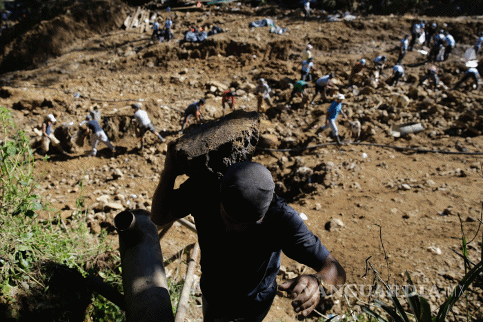 $!Filipinas prosigue agónica búsqueda de decenas de atrapados en mina de oro