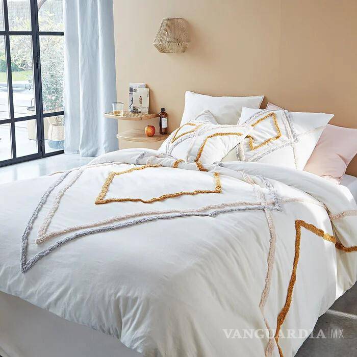 $!Los colores claros y la ropa de cama discreta ayudan a la liberación de espacio.