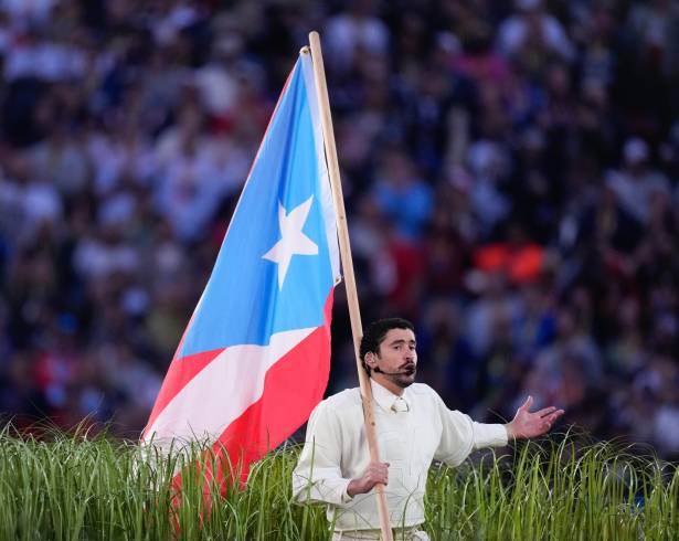 Bad Bunny performs during halftime of the NFL Super Bowl 60 football game between the New England Patriots and the Seattle Seahawks, Sunday, Feb. 8, 2026, in Santa Clara, Calif. (AP Photo/Mark J. Terrill)