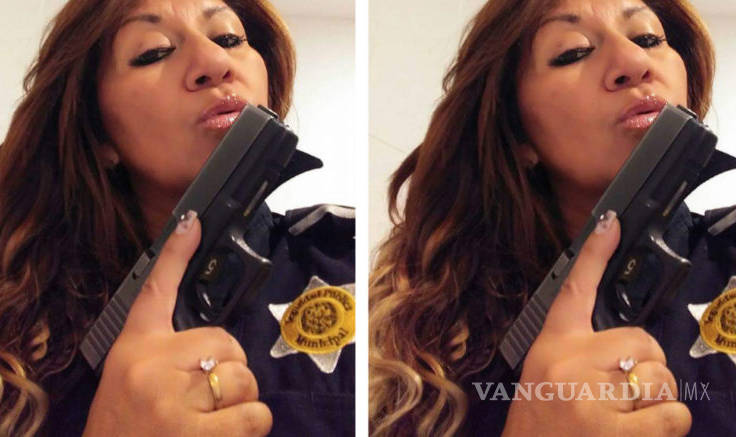 $!Surge #LadyPistolas; porta un uniforme de policiía y muestra sus armas