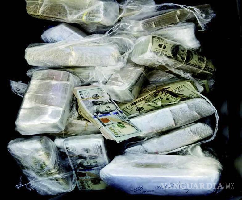 $!debate presidencial351 / 5.000Esta fotografía sin fecha proporcionada por el Fiscal de Distrito de Estados Unidos muestra dinero confiscado de drogas.