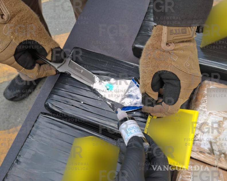 $!NL: mujer ocultaba 39 kilos de cocaína en cajuela de su auto automóvil