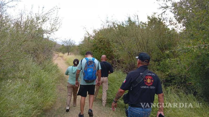 $!El operativo permitió localizar y poner a salvo a los dos senderistas tras el aumento de la corriente.