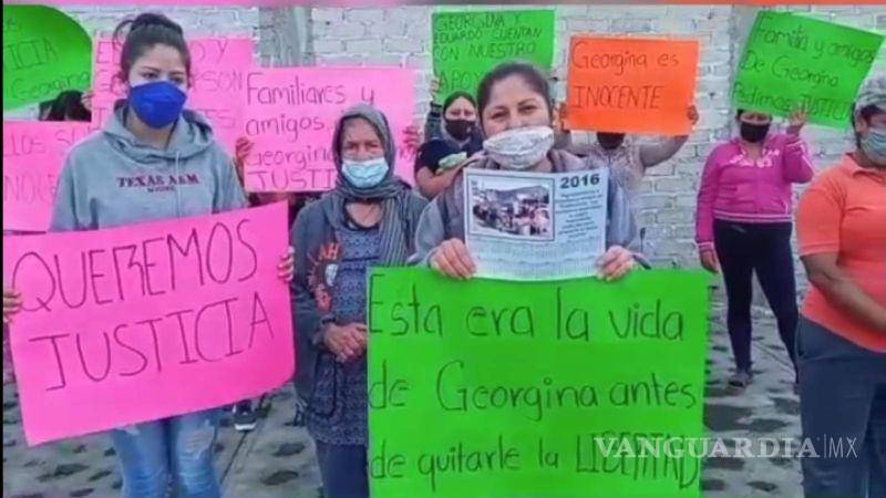 $!En un video que difundieron, integrantes de la familia de Georgina mostraron pancartas en las que piden justicia para la mujer, y afirman que “no sería capaz de hacer algo así”