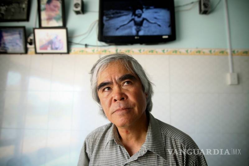 Laureado fotógrafo de la niña de napalm, Nick Ut se retira