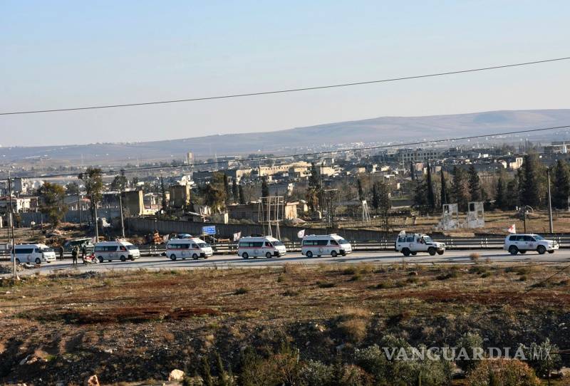 $!Primeros evacuados del este de Alepo en convoy de ambulancias y autobuses