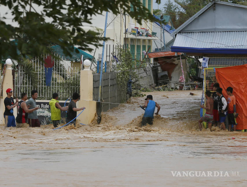$!Suman 13 muertos en Filipinas por tifón 'Koppu'