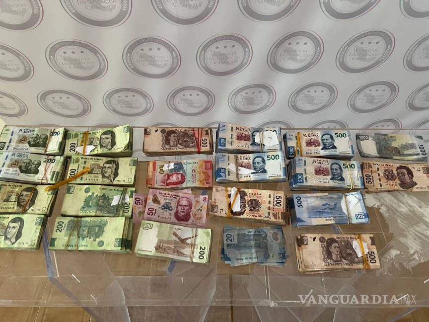 En Nuevo León detienen a dos hombres con más de medio millón de pesos oculto en tractocamión