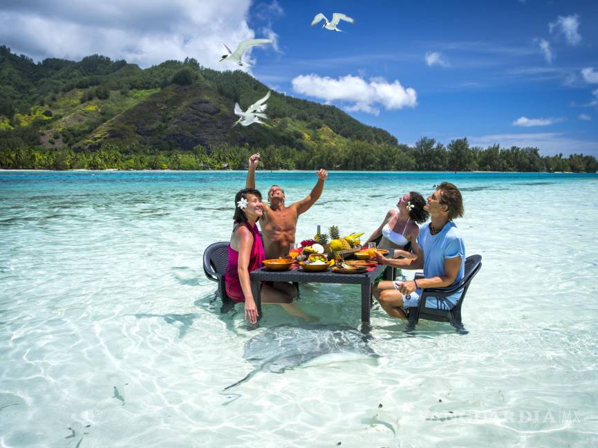 $!Turistas en las aguas paradisíacas de Moorea, Polinesia Francesa. Foto: David Kirkland/Open Comunicación.