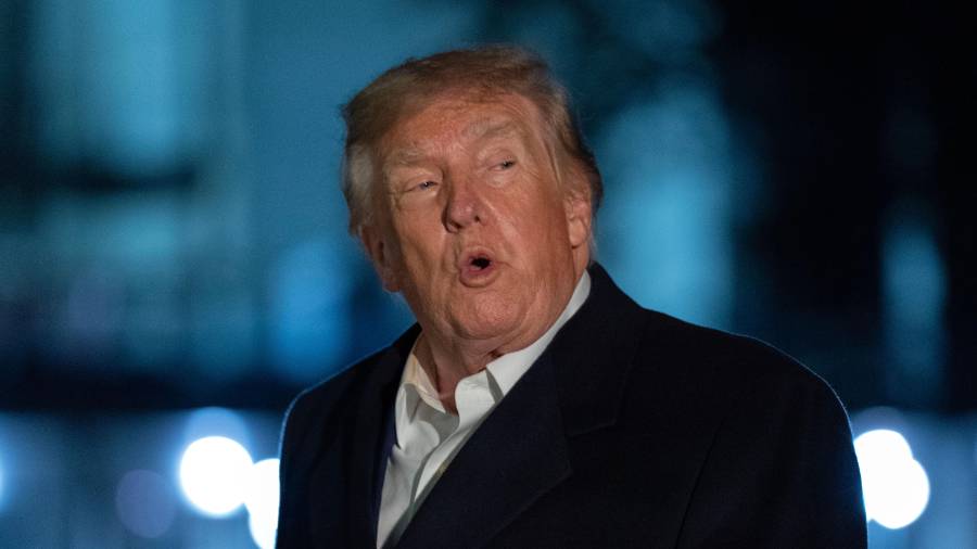 President Donald Trump talks to reporters as he walks on the South Lawn upon his arrival to the White House, Thursday, Oct. 8, 2026, in Washington. (AP Photo/Jose Luis Magana)