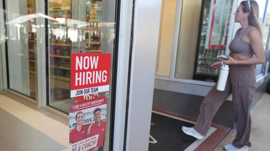 A for hire sign is displayed at a GNC store Friday, Jan. 9, 2026, in Miami Beach, Fla. (AP Photo/Marta Lavandier)