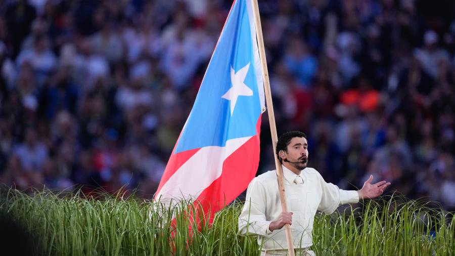 Bad Bunny performs during halftime of the NFL Super Bowl 60 football game between the New England Patriots and the Seattle Seahawks, Sunday, Feb. 8, 2026, in Santa Clara, Calif. (AP Photo/Mark J. Terrill)
