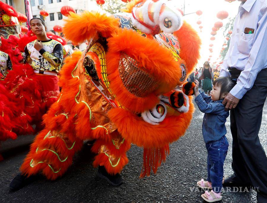 $!En varias partes del mundo los chinos festejaron su mayor fiesta del año, el Año Nuevo Lunar, China canceló la celebración