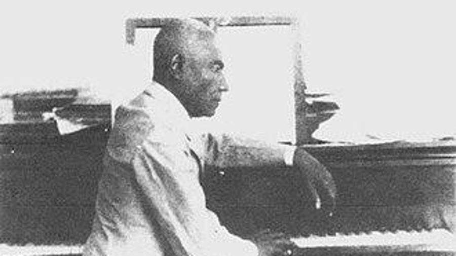 Tres músicos haitianos