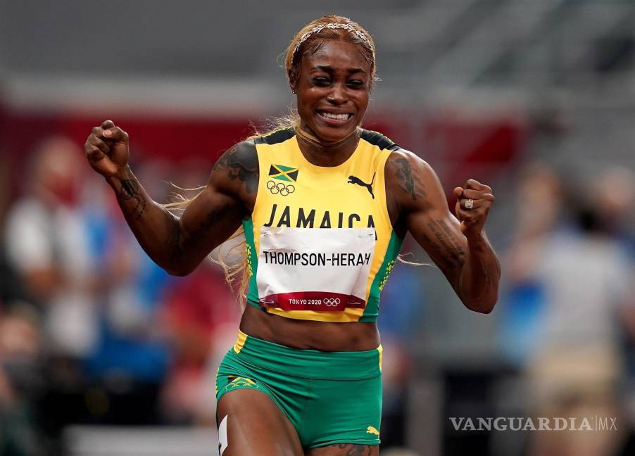 $!Elaine Thompson Herah de Jamaica reacciona después de ganar el oro en la final femenina de 100 metros durante los eventos de atletismo de los Juegos Olímpicos de Tokio 2020 en el Estadio Olímpico de Tokio, Japón. EFE