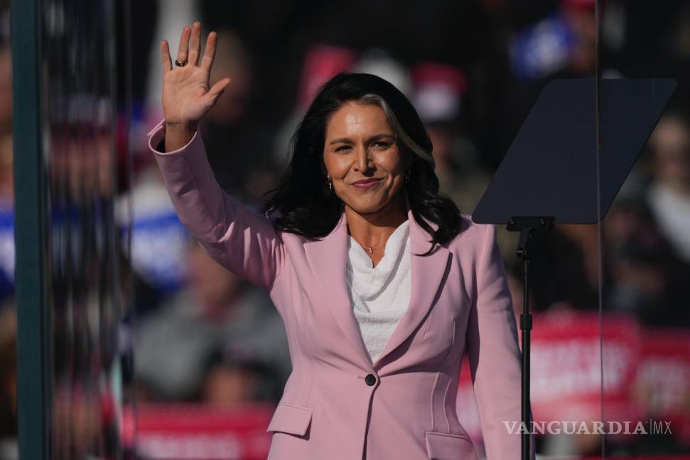 $!FILE - Tulsi Gabbard arrives to speak before Republican presidential nominee former President Donald Trump at a campaign rally in Lititz, Pa., Nov. 3, 2024. (AP Photo/Matt Rourke, File)