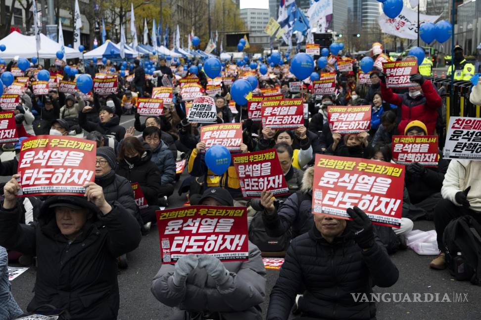 $!Aspectos de las protestas en Corea del Sur en contra de la promulgación de ley marcial.