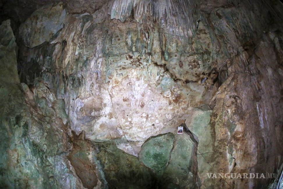 $!Fotografía donde se observa una pintura rupestre en la caverna Kixné en un cenote de la Hacienda Kampepén en el municipio de Homún (México).