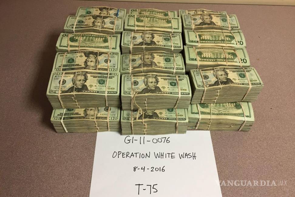 $!Esta foto proporcionada por la DEA muestra dólares confiscados en la Operación “White Wash” o Lavado Blanco en 2016.