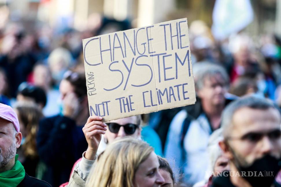 $!“Cambia el sistema, no el clima” frase alusiva al cambio climático sin apoyo de proyectos políticos