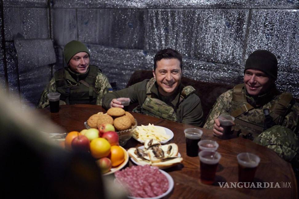 $!In this handout photo provided by the Ukrainian Presidential Press Office, Ukrainian President Volodymyr Zelenskyy meets with service members of the country's armed forces at combat positions in Donetsk region, eastern Ukraine, Thursday, Feb. 17, 2022. U.S. Secretary of State Antony Blinken told ABC News that Russian President Vladimir Putin can pull the trigger. He can pull it today. He can pull it tomorrow. He can pull it next week. The forces are there if he wants to renew aggression against Ukraine. NATO Secretary-General Jens Stoltenberg and Ukrainian President Volodymyr Zelenskyy also dismissed the Russian claims. (Ukrainian Presidential Press Office via AP)
