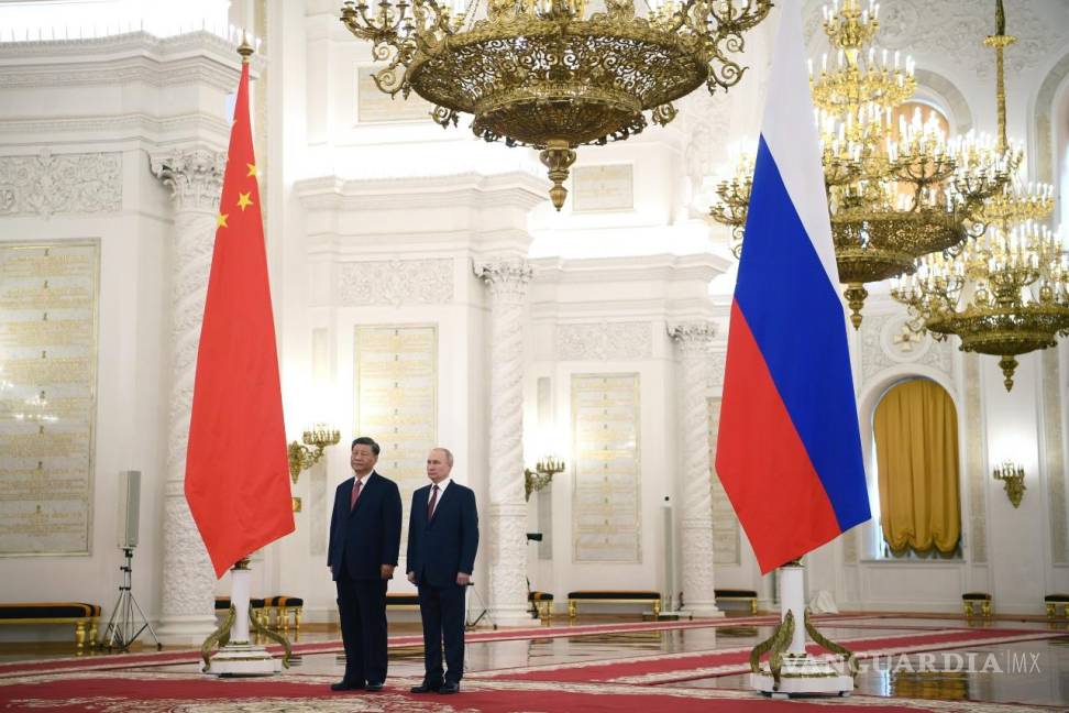$!El presidente ruso, Vladimir Putin y el presidente chino, Xi Jinping, asisten a una ceremonia oficial de bienvenida en el Gran Palacio del Kremlin, en Moscú, Rusia.