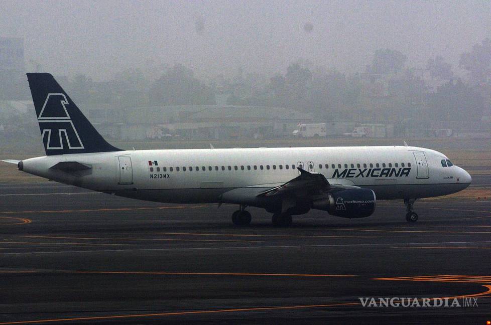 $!Fotografía de archivo fechada el 19 de febrero de 2008, que muestra un avión de Mexicana de Aviación, en una pista del Aeropuerto Internacional de la CDMX.